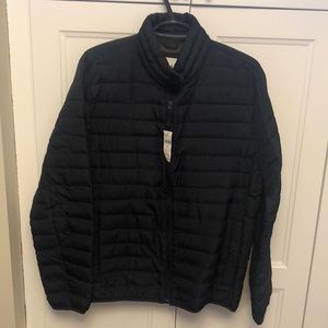 A brand new blue puffer jacket from The Gap